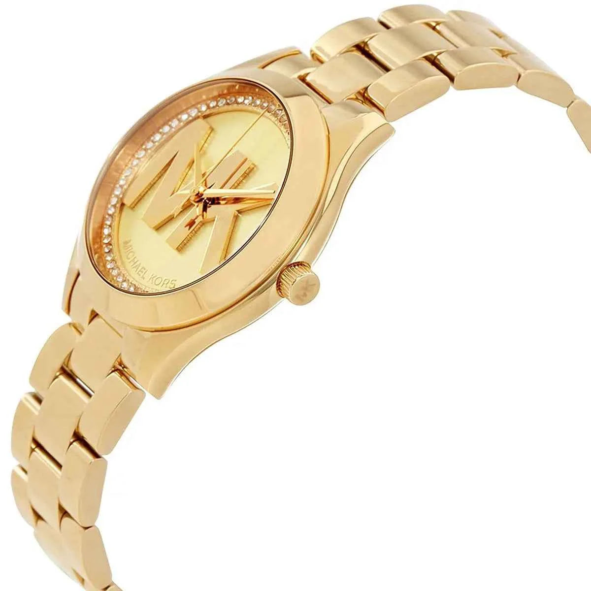 Close-up view of Michael Kors MK3477 gold analog dial with minimalist markers