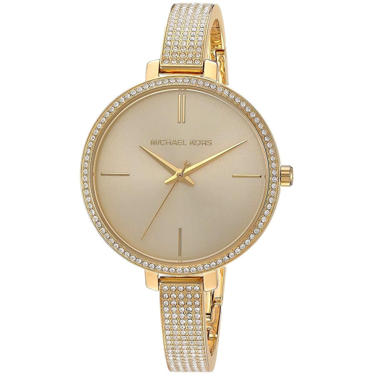 Close-up view of Michael Kors MK3784 gold analog dial with elegant hour markers