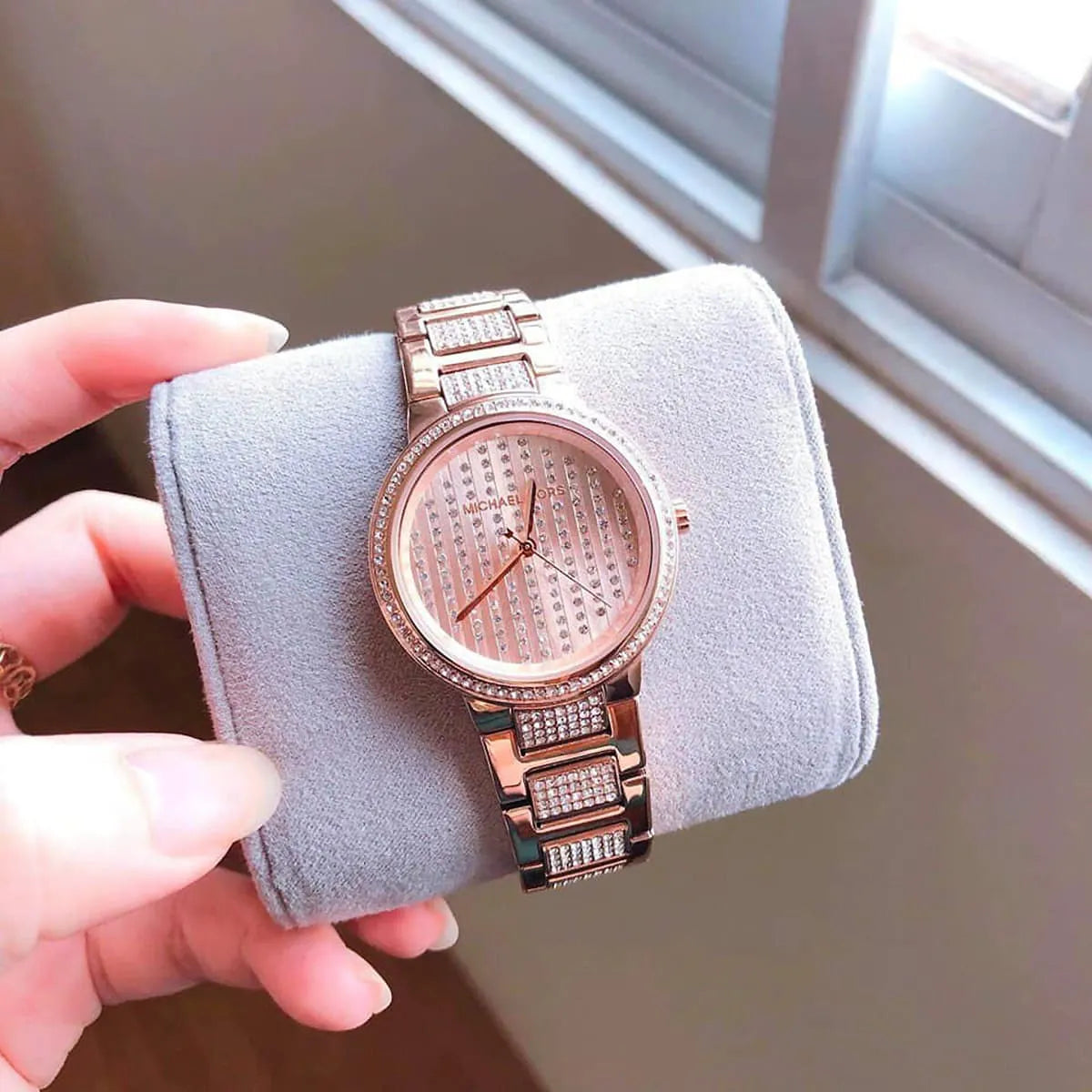 Close-up of Michael Kors MK3986 rose gold analog dial