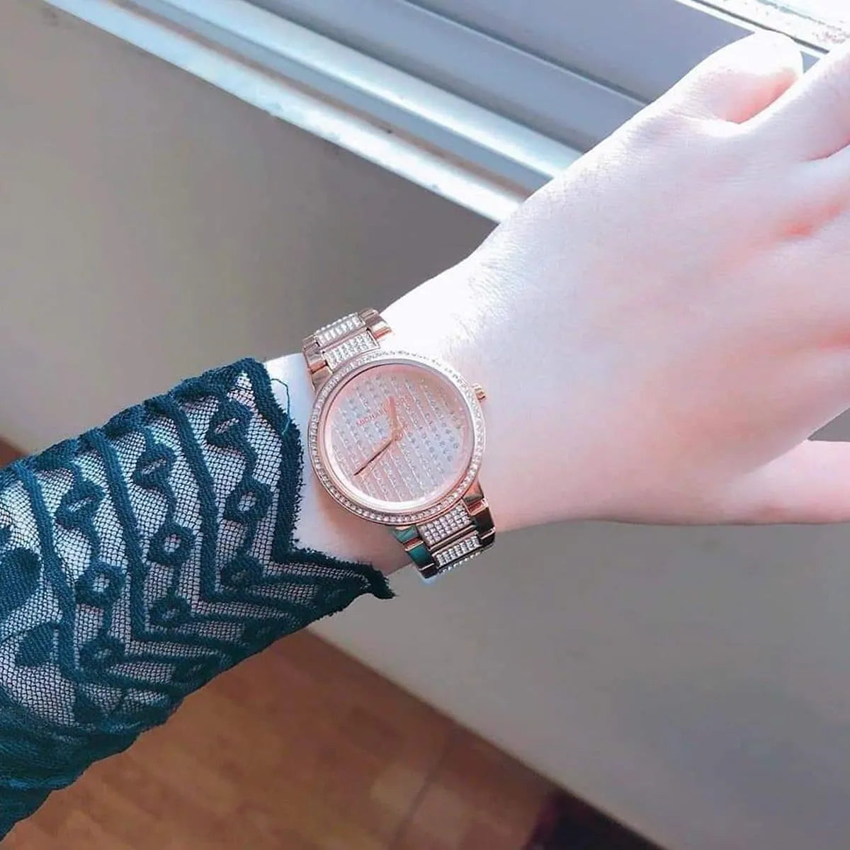 Close-up of Michael Kors MK3986 rose gold analog dial 2