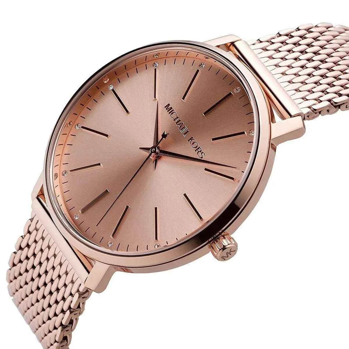 Close-up of Michael Kors MK4340 rose gold analog dial
