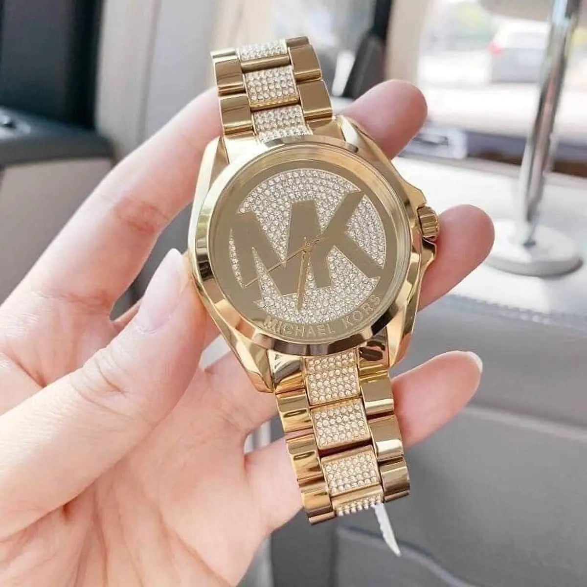 Close-up view of Michael Kors MK6487 silver analog dial