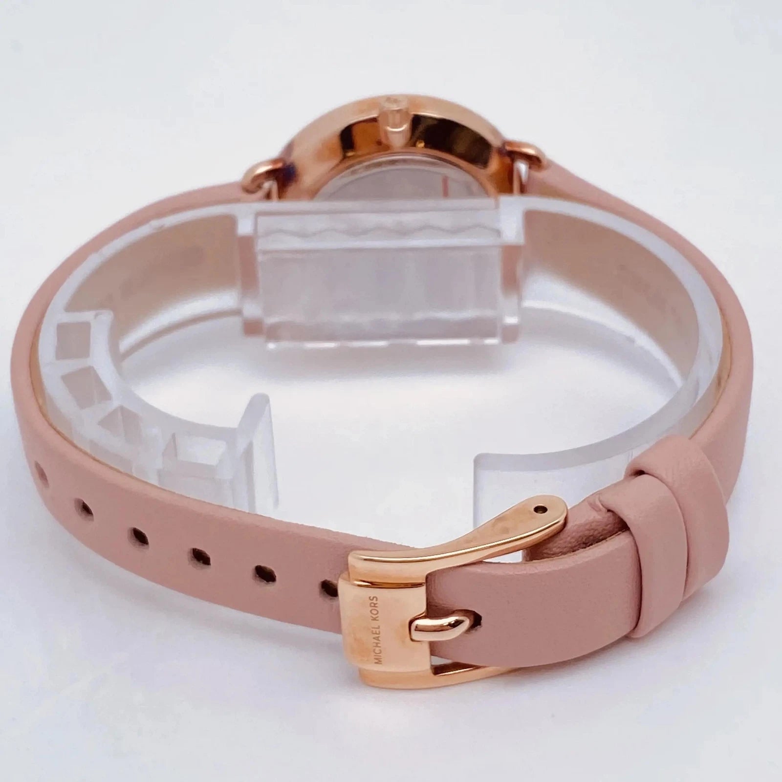 Side profile of Michael Kors Portia MK2735 pink leather strap women's watch