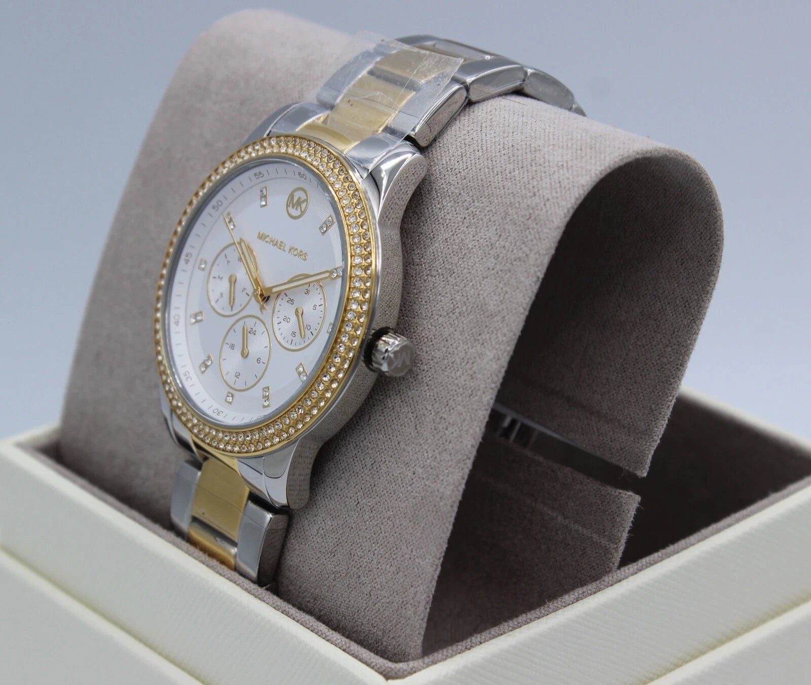 Side profile of Michael Kors Tibby MK6825 silver and gold bracelet watch