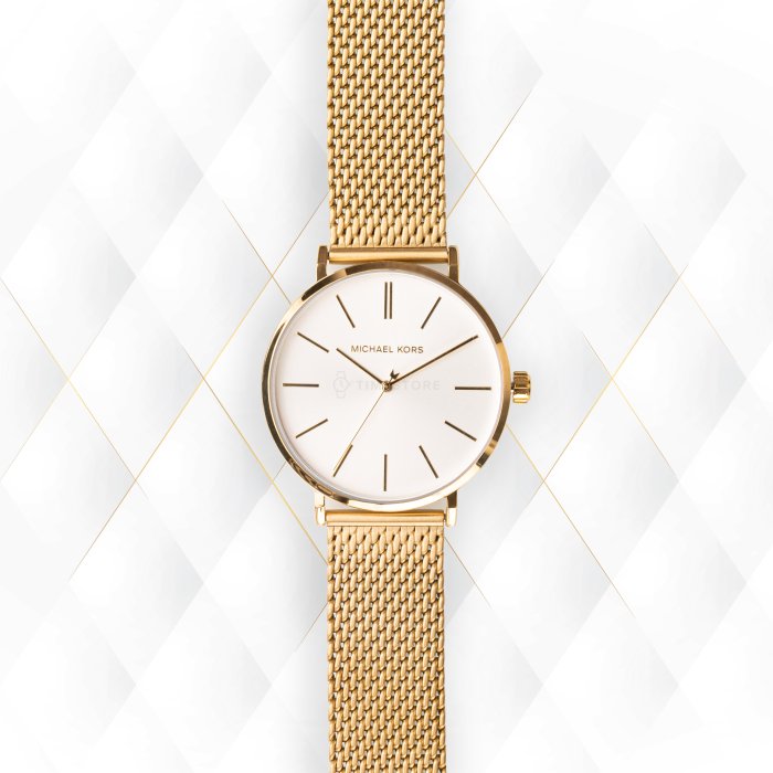 Close-up of Michael Kors MK7150 white analog dial with gold-tone indexes