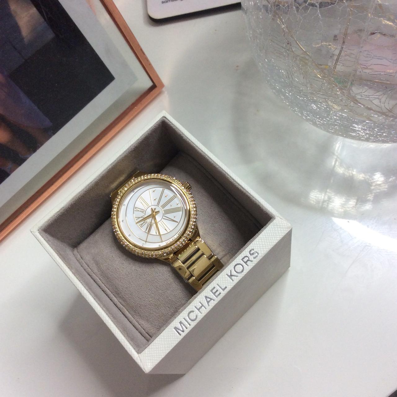Side view of Michael Kors Taryn MK6567 gold stainless steel bracelet watch