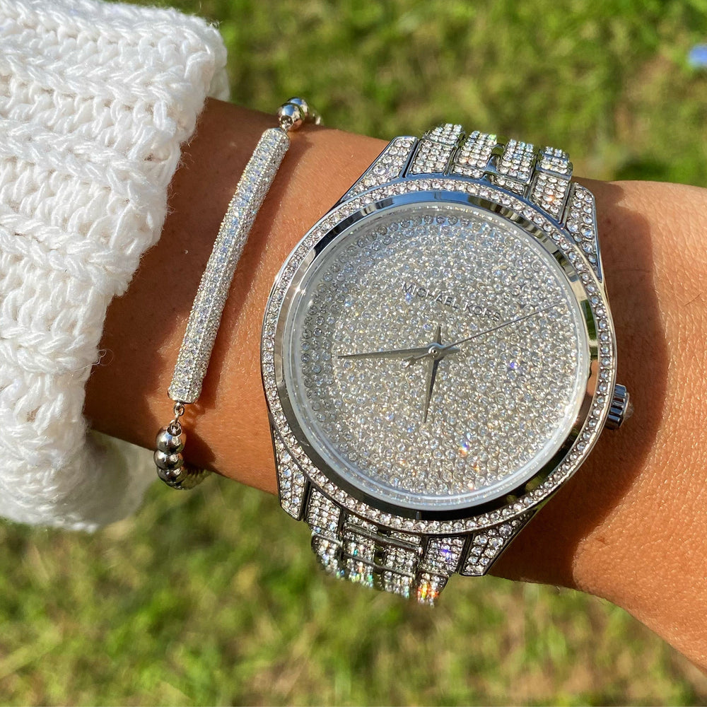 Close-up view of Michael Kors MK3717 silver analog dial with pave detailing