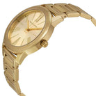 Close-up view of Michael Kors MK3490 gold analog dial with elegant markers