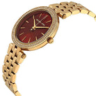 Close-up view of Michael Kors MK3583 red analog dial with elegant markers