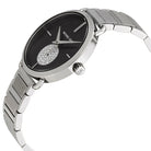 Close-up view of Michael Kors MK3638 black analog dial with elegant markers