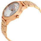 Close-up view of Michael Kors MK3673 white analog dial with elegant hour markers