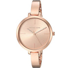 Close-up view of Michael Kors MK3735 rose gold analog dial with elegant hour markers