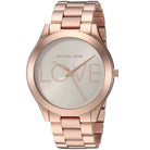 Close-up view of Michael Kors MK3804 white analog dial with elegant hour markers