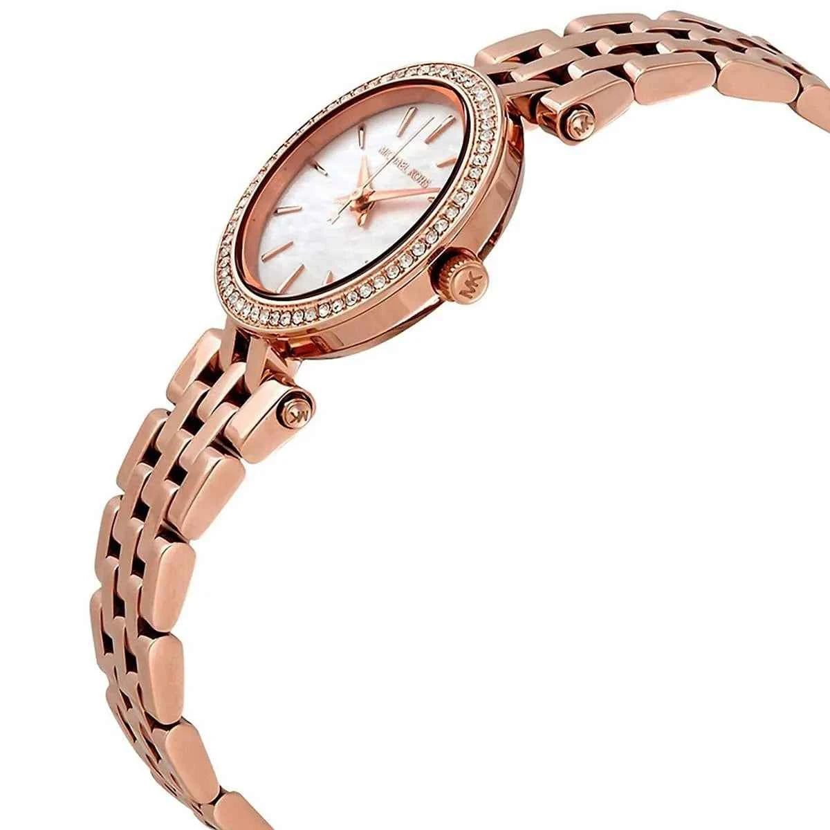 Close-up view of Michael Kors MK3832 white analog dial with elegant hour markers