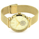 Close-up view of Michael Kors MK3844 gold analog dial with elegant hour markers