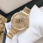 Close-up of Michael Kors MK3886 gold analog dial with elegant details