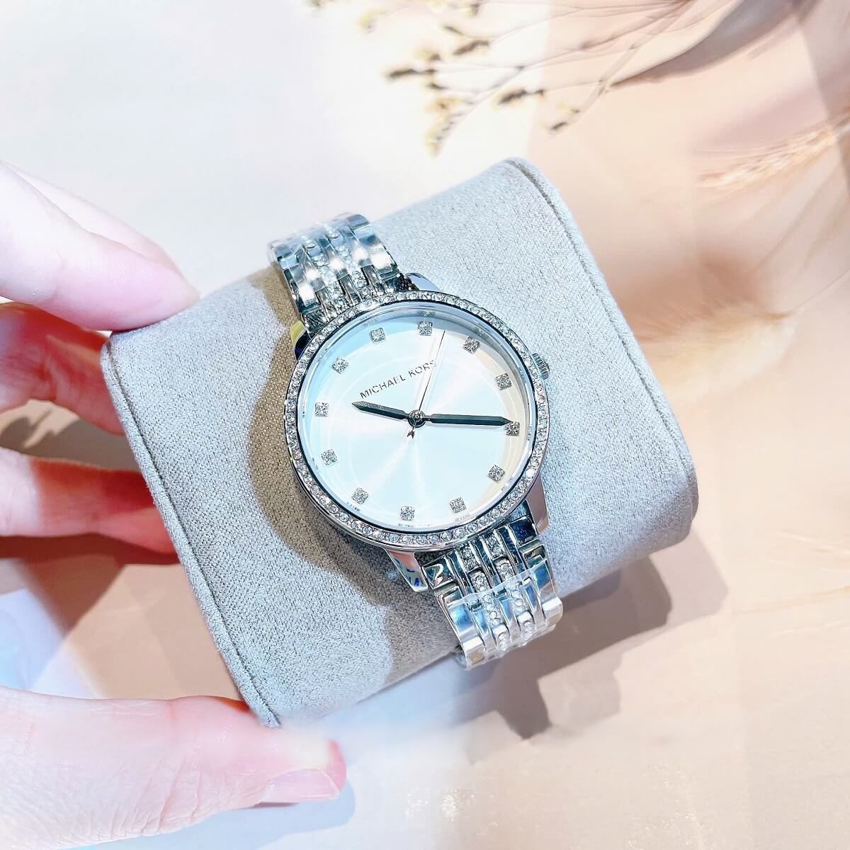 Close-up of Michael Kors MK4367 silver analog dial with date display