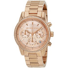 Close-up of Michael Kors MK6357 rose gold analog dial with rose gold stainless steel bracelet