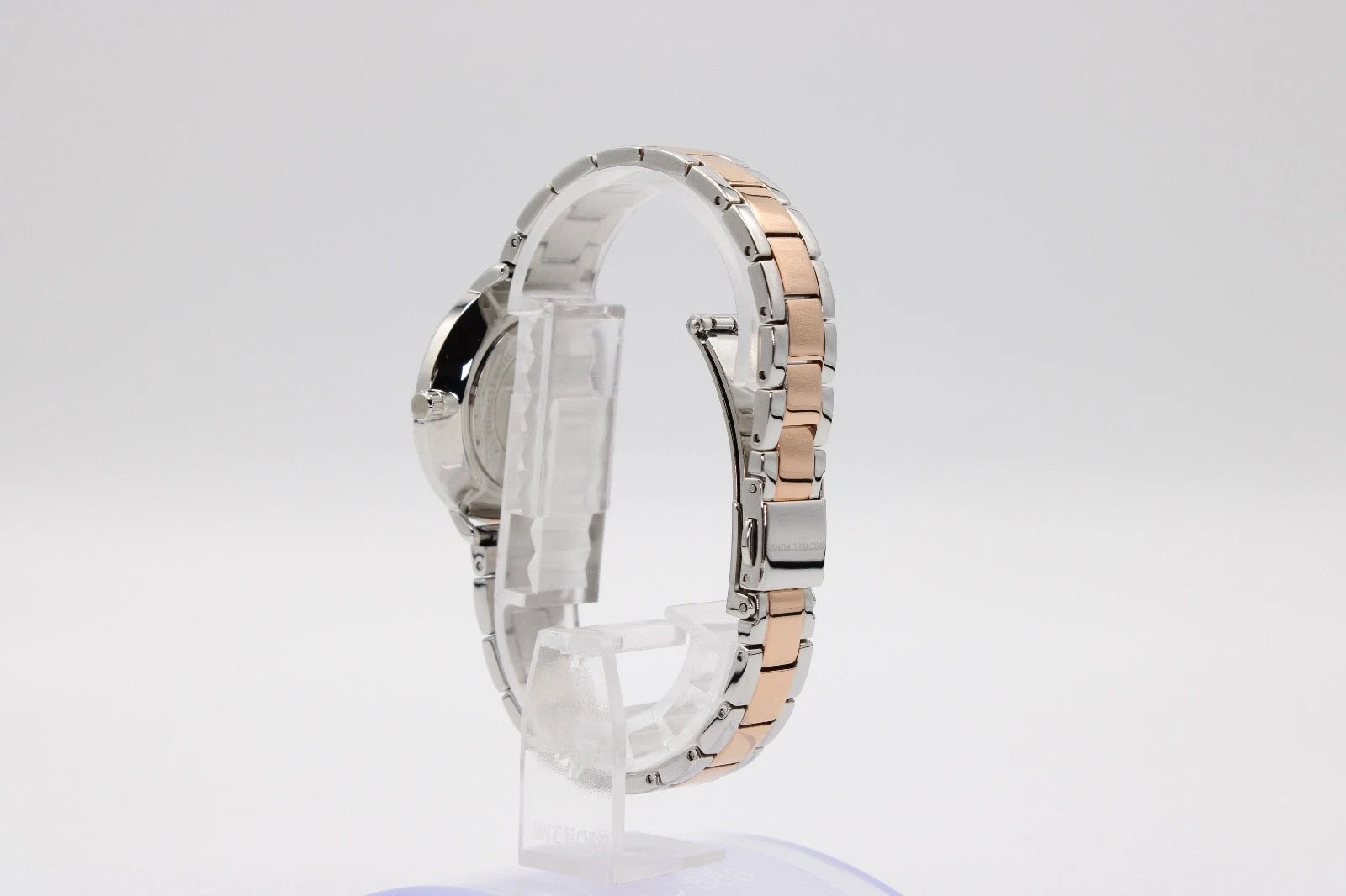 Back case of Michael Kors MK1066 women's two-tone stainless steel wristwatch