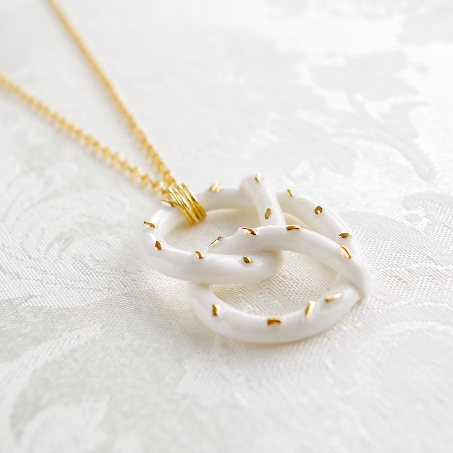 POPORCELAIN Golden Salted Porcelain Pretzel Pendant Necklace